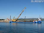 Porto Pino - lavori canale - 07.04.2011 - La draga ritorna in porto
