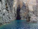 Porto Pino - Ingresso della grande grotta di Cala Piombo, visitabile in barca
