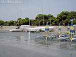 Porto Pino - Spiagge - 2011, inizio settembre: la prima spiaggia dopo una sciroccata (sullo sfondo, le barche della nostra scuola vela)