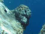 Porto Pino foto subacquee - 2006 - Presso Punta Menga, curiosa roccia a foggia di testa di troll..
