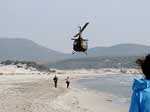 Porto Pino - 2003, primavera, elicottero militare basso sulla spiaggia quasi deserta, presso le dune